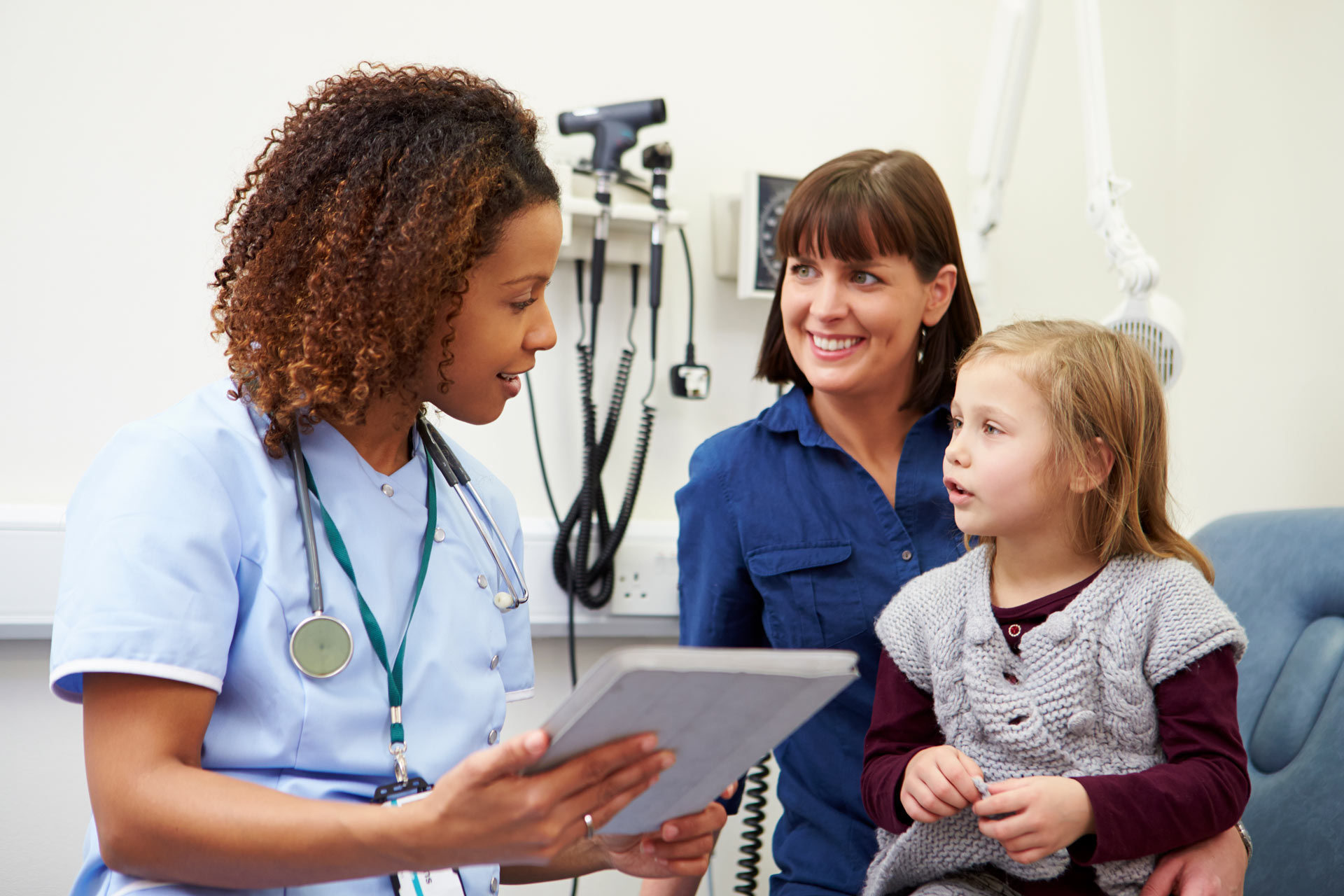 Nurse with patient and child